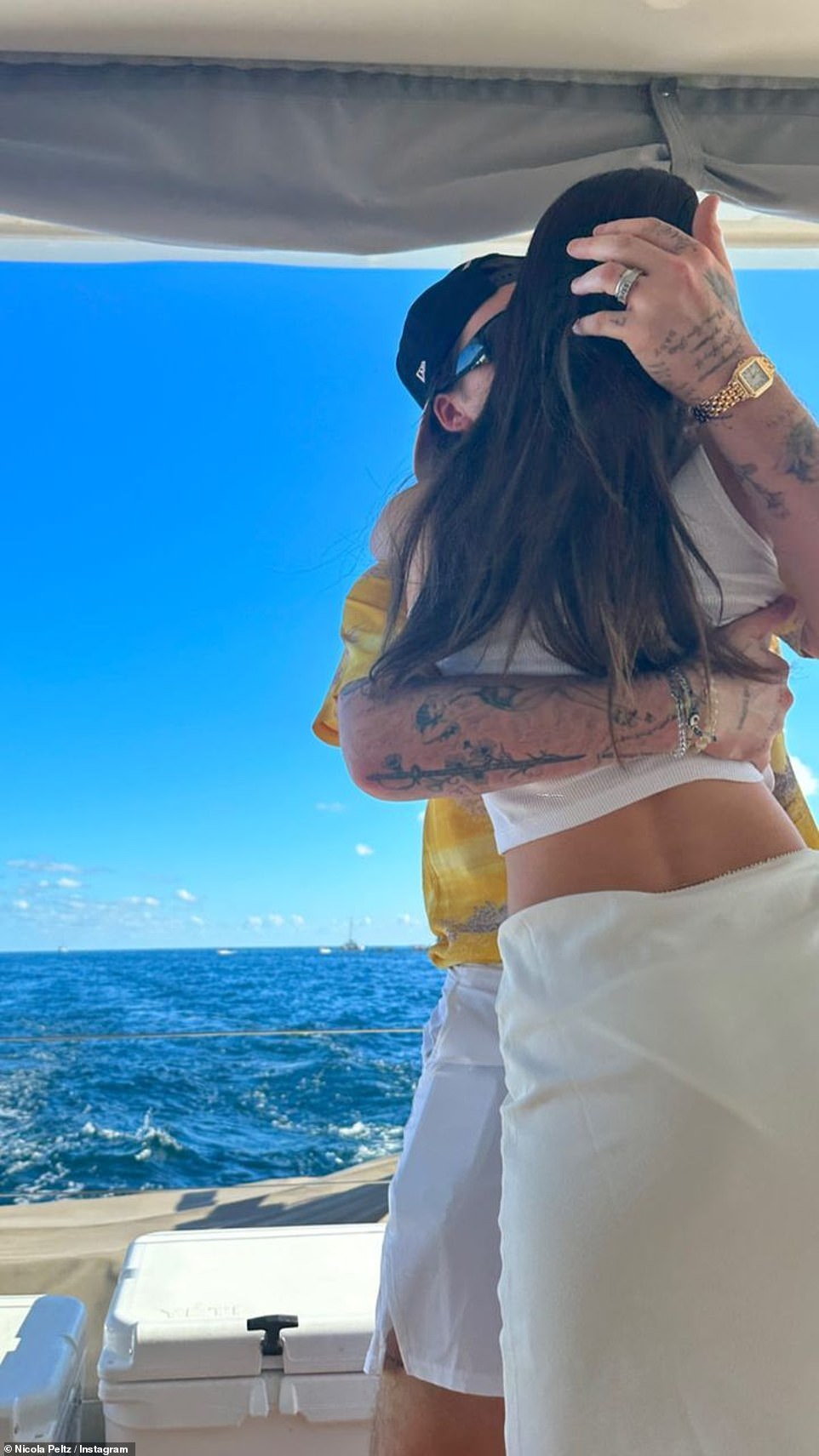 So cute! Nicole was pictured kissing her husband, whom she tied the knot with last year in April, while on a boat
