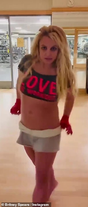 Athletic: The songstress can be seen dancing it up in a pair of tiny grey shorts that show off her athletic midsection