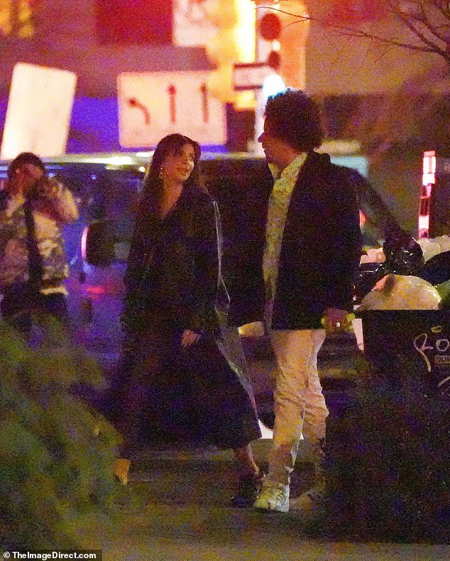 Sweet: The two shared plenty of eye contact on the romantic stroll