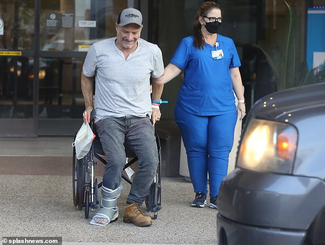 EXCLUSIVE: ‘Fortunate to be alive’ Rick Leventhal seen for the primary time since horrifying automotive accident as he leaves hospital in a wheelchair with RHOC spouse Kelly Dodd