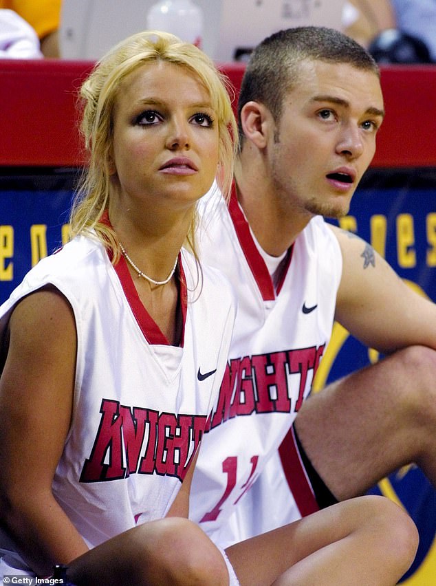 Better times: During the charity event, which took place at the Thomas & Mack Center in Las Vegas, Nevada, the singer sported a white Knight's jersey and a pair of baggy shorts