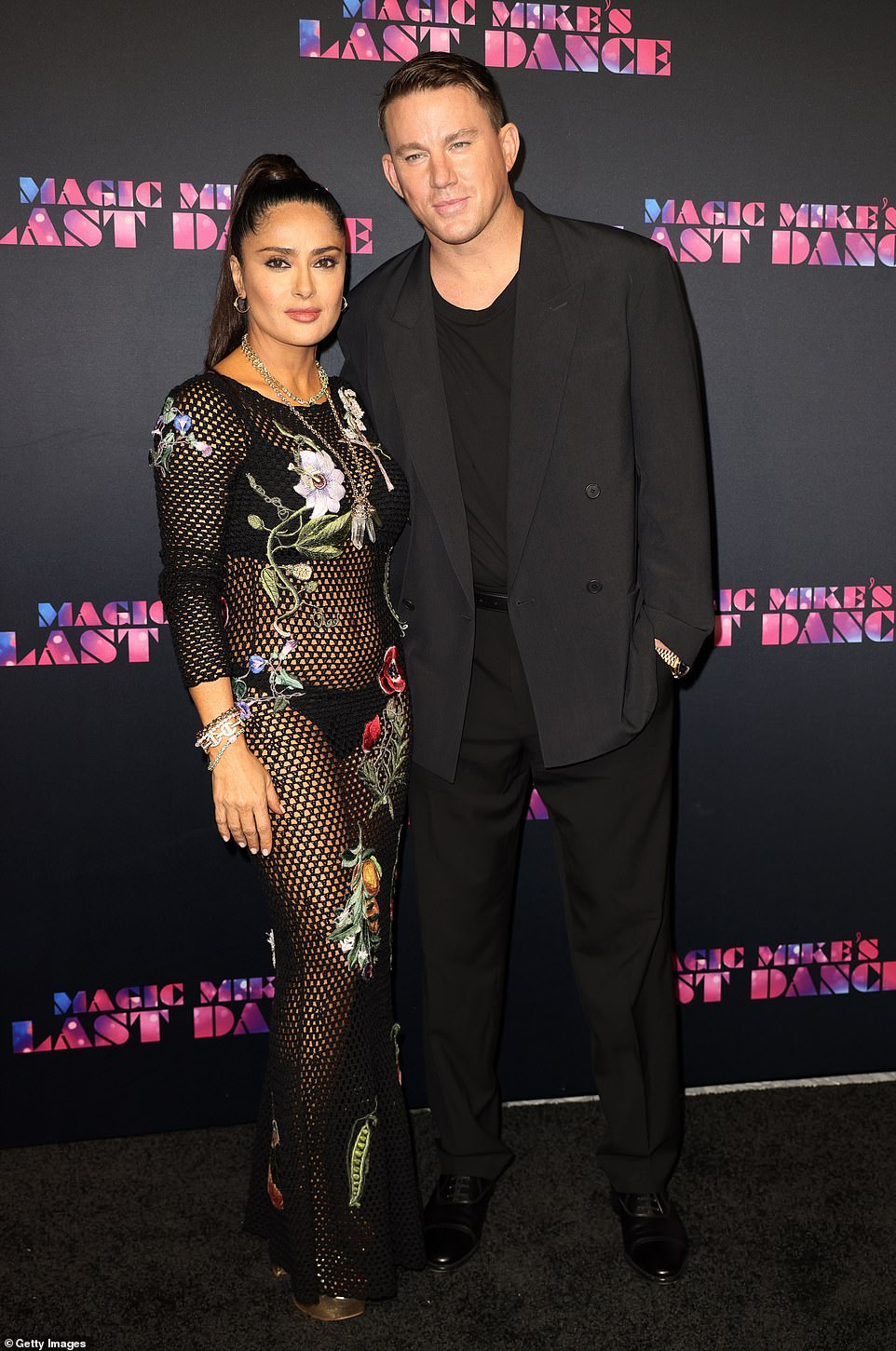 Suave: For Wednesday's big premiere, Tatum, 42, looked suave in a stylish black suit with a plain black tee tucked into the trousers