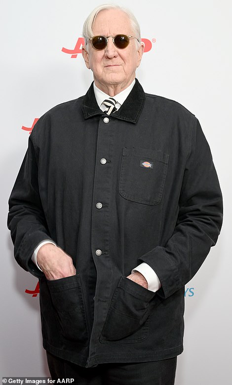Edgy: T Bone Burnett looked edgy with his hands in his pockets and a stylish pair of shades on