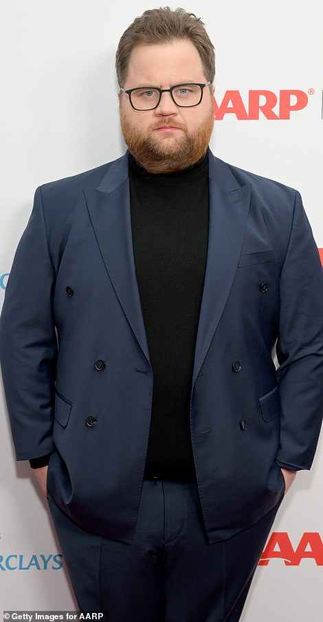 Looking good: Paul Walter Hauser had his game face on while donning a navy suit
