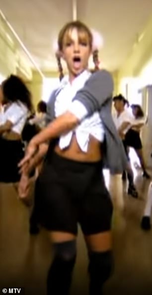 Flashback: Spears also posted a separate clip in which she was clad in a similar ensemble to the one she wore in the video of her 1998 breakout track ...Baby One More Time