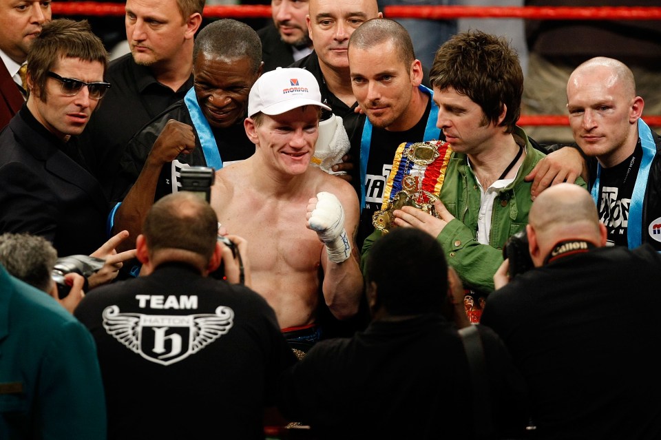 Boxer Ricky Hatton and his team celebrate his victory, with Noel and Liam Gallagher of Oasis.