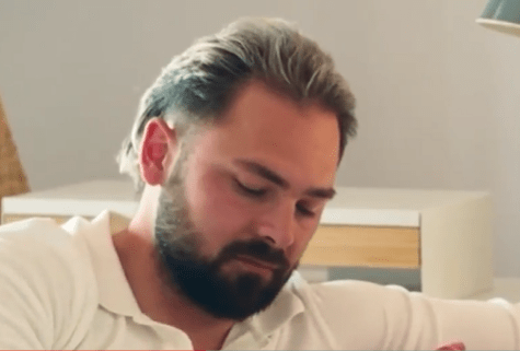Bradley Dack, husband of Olivia Attwood, looking down while on Bad Boyfriends.
