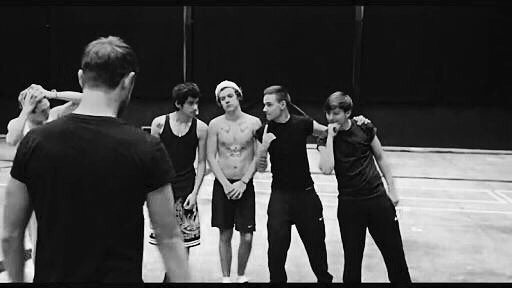 Paul Roberts rehearsing with One Direction.
