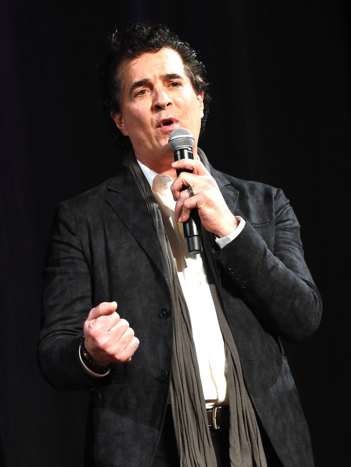 CEO of Big Machine Records, Scott Borchetta, speaking into a microphone.