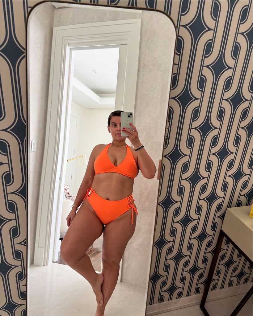 Nelly Furtado poses for a mirror selfie wearing an orange string bikini, shared on Instagram
