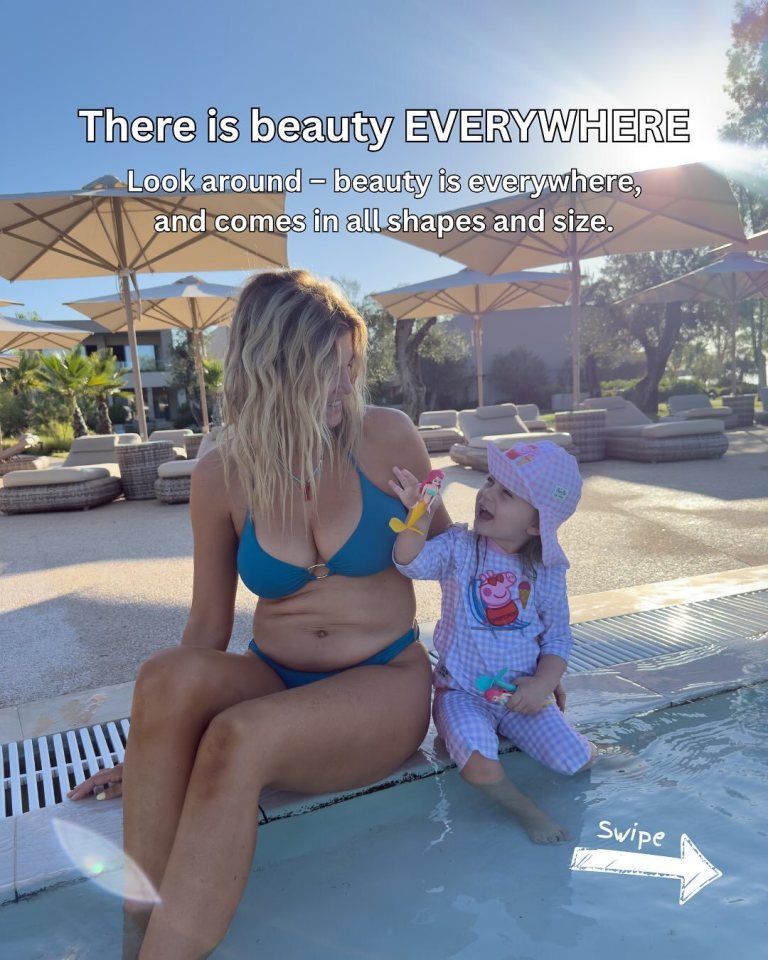 Woman in a blue bikini with her child at the edge of a pool.
