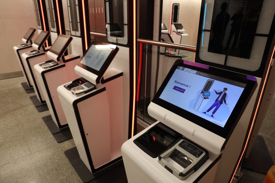 Rows of EES kiosks at St Pancras International Train Station for international check-in.