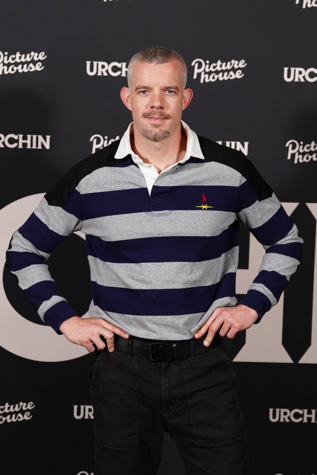 Actor Russell Tovey posing at a film premiere.