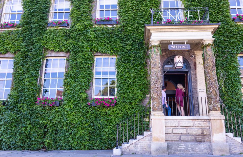 The Angel Hotel, Bury St Edmunds, covered in ivy.