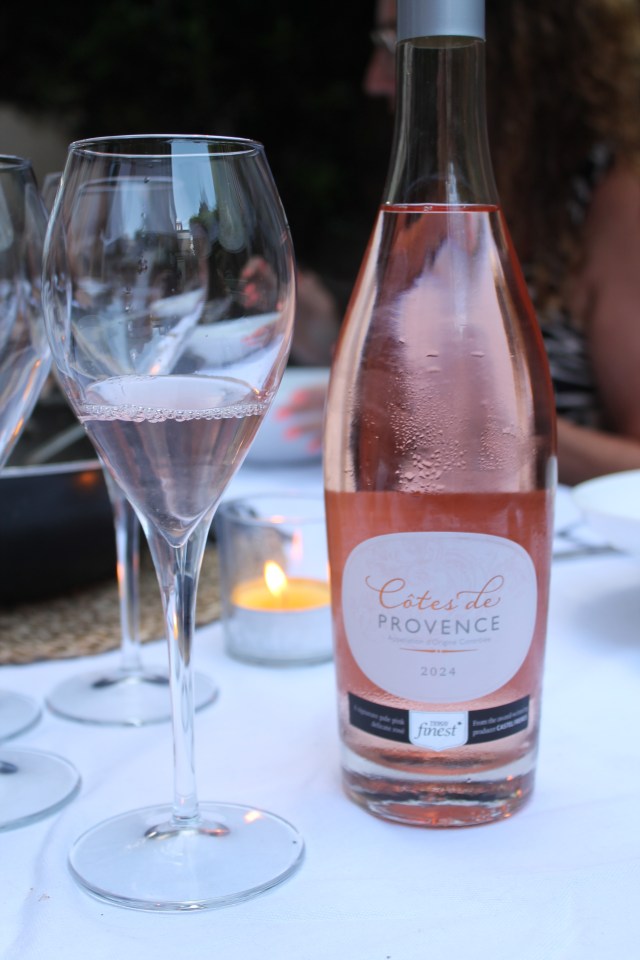 Bottle of Côtes de Provence rosé wine and glasses.