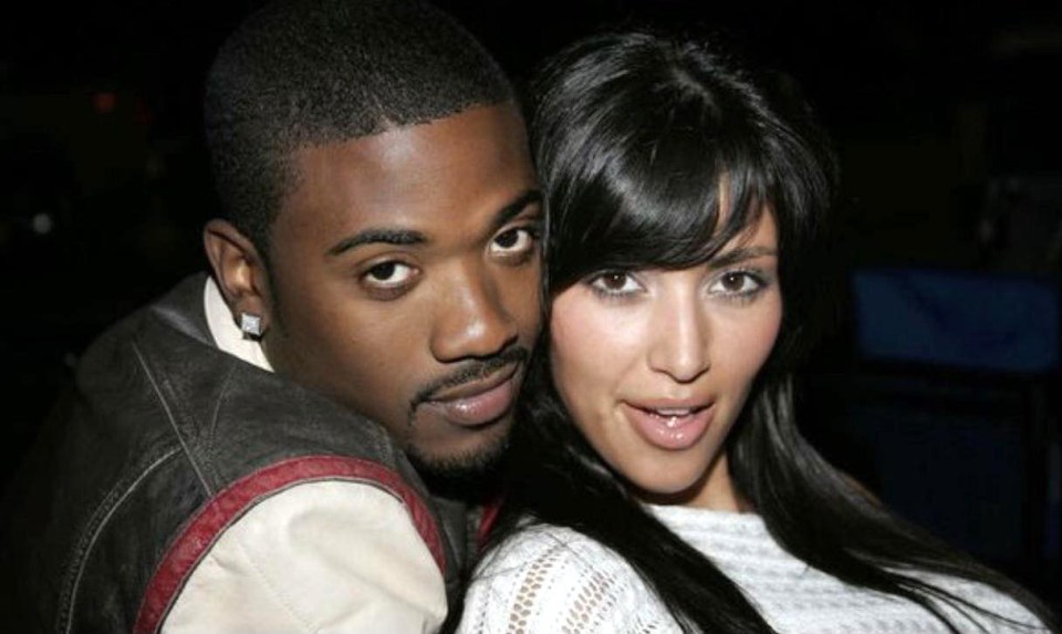 Ray J and Kim Kardashian posing for a photo.
