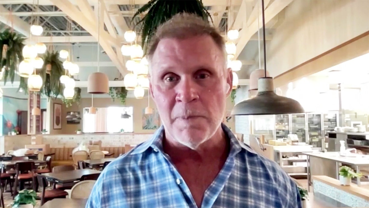 Michael McDermott appears from inside a revived Chi-Chi's restaurant.