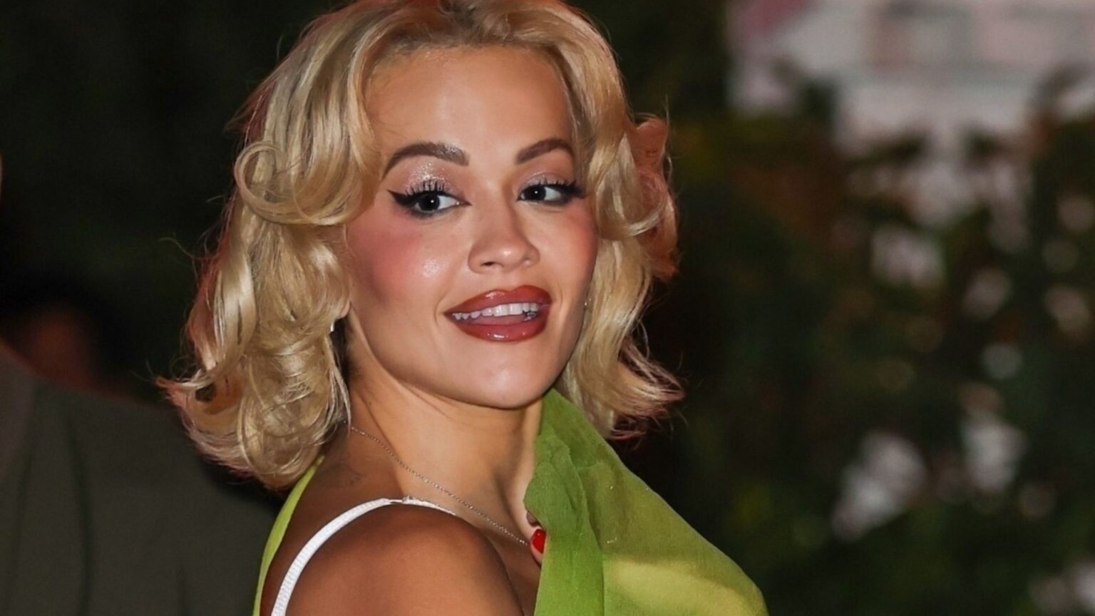 Rita Ora flashes thong in backless transparent gown on glam night out Rita Ora flashes thong in backless transparent gown on glam night out