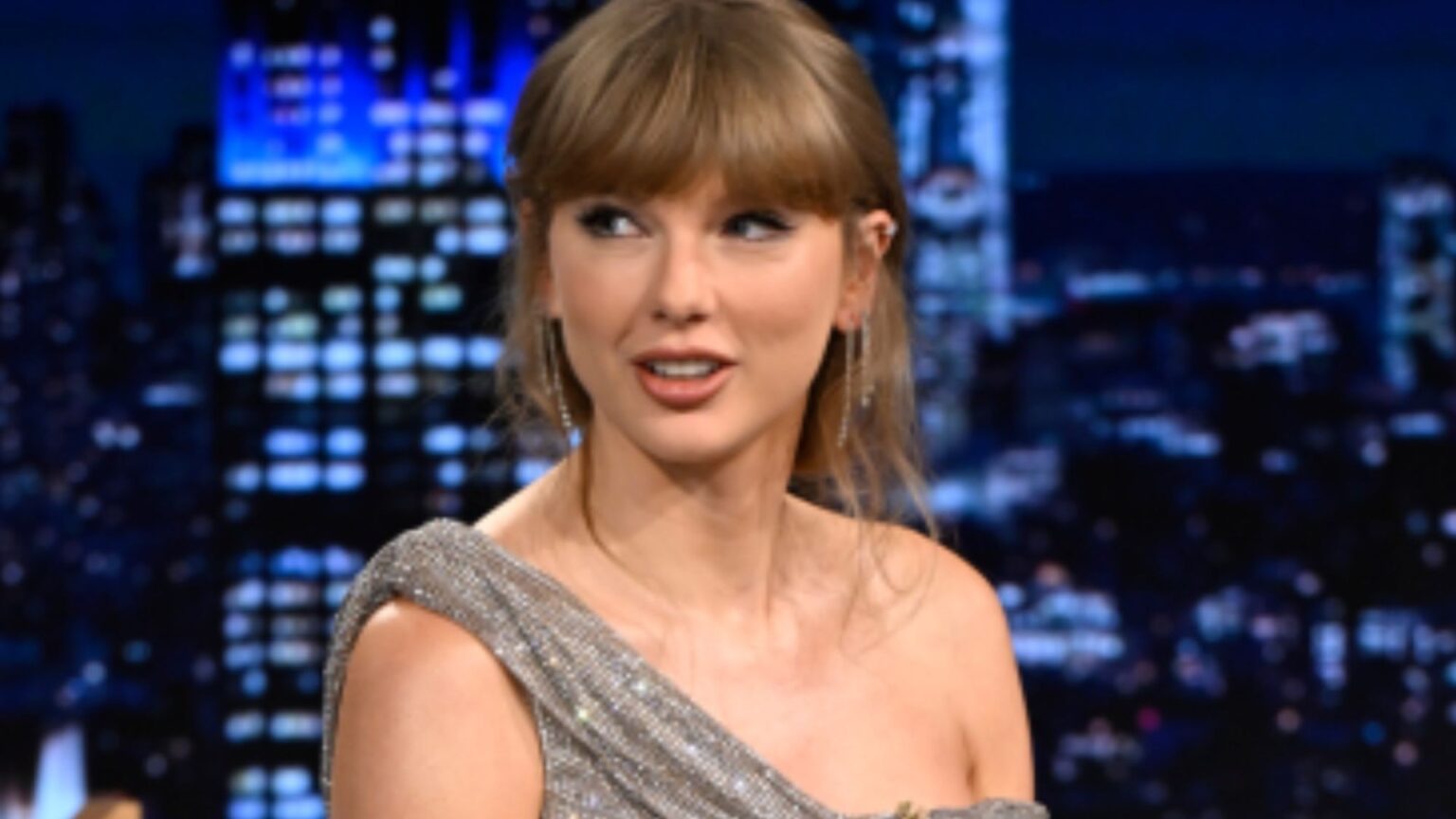 Taylor Swift stuns in an attractive sequined gown and matching heels