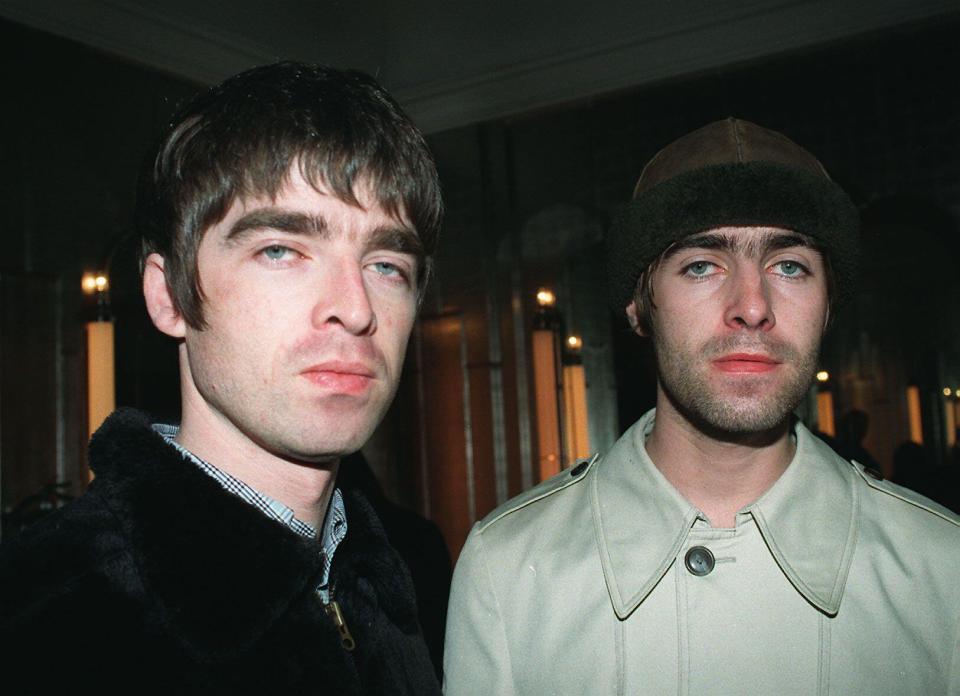 Noel and Liam Gallagher, singer and guitarist respectively from the band Oasis.