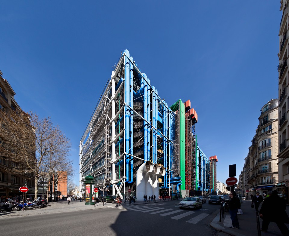 Centre Pompidou in Paris, with exposed red escalators and structural elements on the building's exterior.
