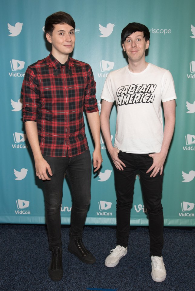 YouTube and radio personalities Dan Howell and Phil Lester posing at VidCon.