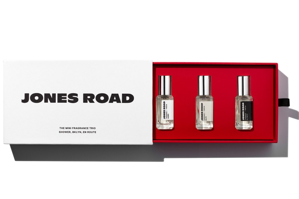 Jones Road Mini Fragrance Trio with Shower, Bklyn, and En Route scents in a red box.